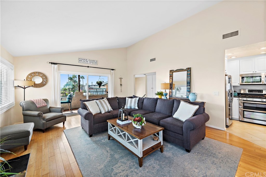 312 Avenida Granada, Unit A San Clemente, CA 92672 - Photo 5 of 25 a living room with furniture and wooden floor