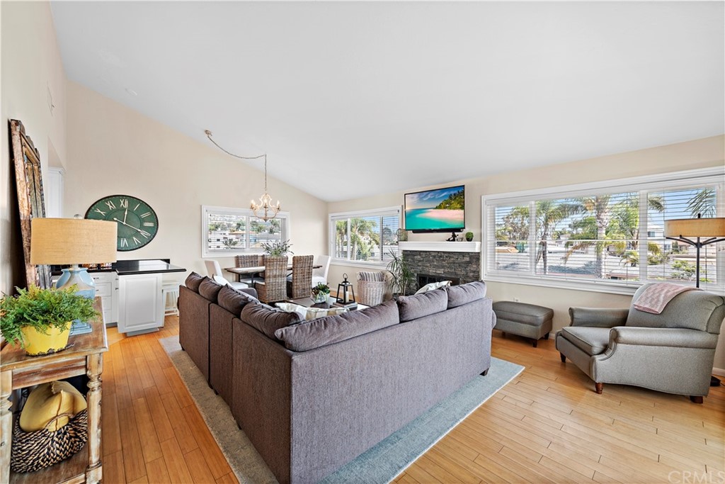 312 Avenida Granada, Unit A San Clemente, CA 92672 - Photo 6 of 25 a living room with furniture and a large window