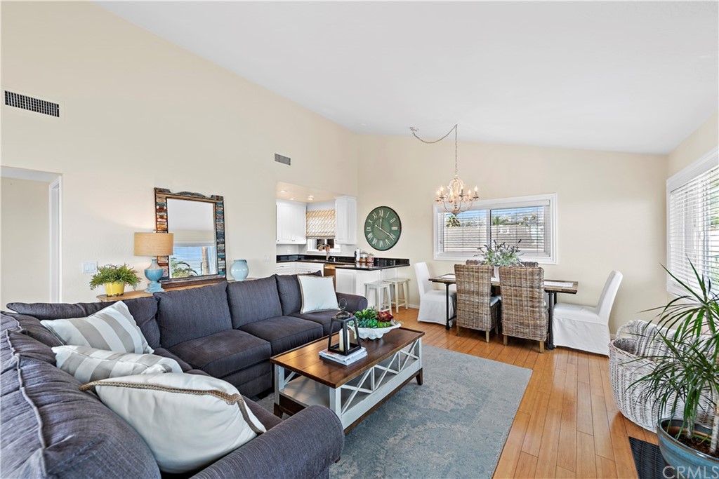 312 Avenida Granada, Unit A San Clemente, CA 92672 - Photo 9 of 25 a living room with furniture and a large window