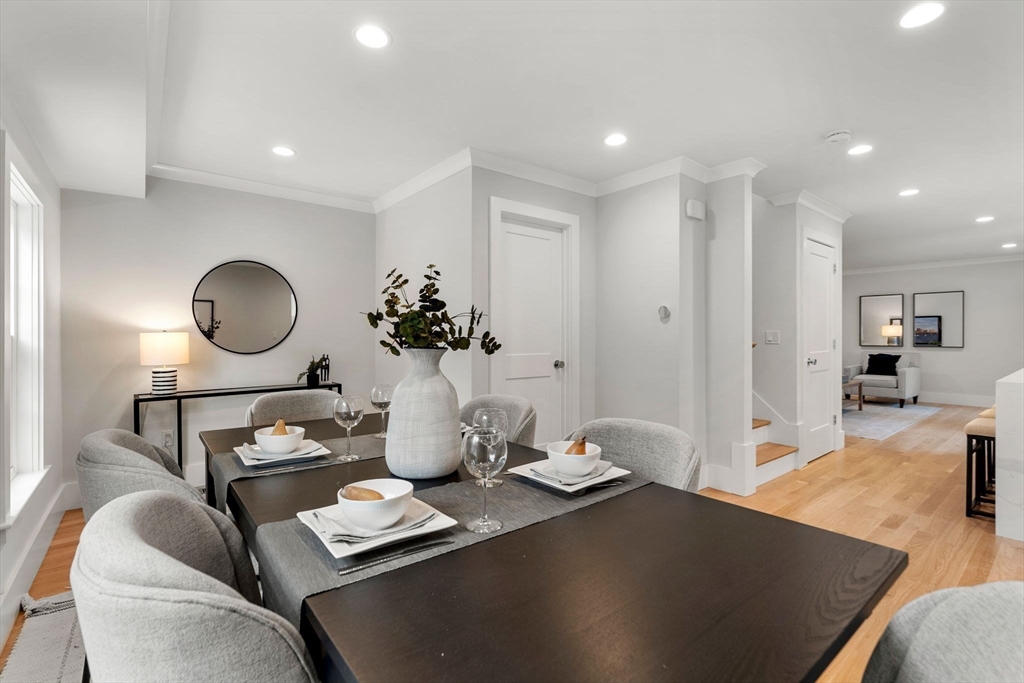 143 Derby Street, Unit 1 Salem, MA 01970 - Photo 14 of 42 a living room with furniture and a mirror