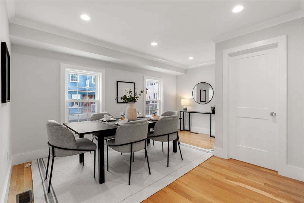 143 Derby Street, Unit 1 Salem, MA 01970 - Photo 15 of 42 a view of a dining room with furniture and window