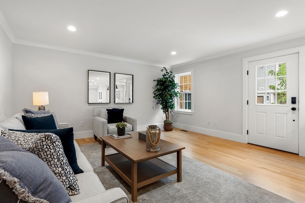 143 Derby Street, Unit 1 Salem, MA 01970 - Photo 19 of 42 a bedroom with a bed and a window