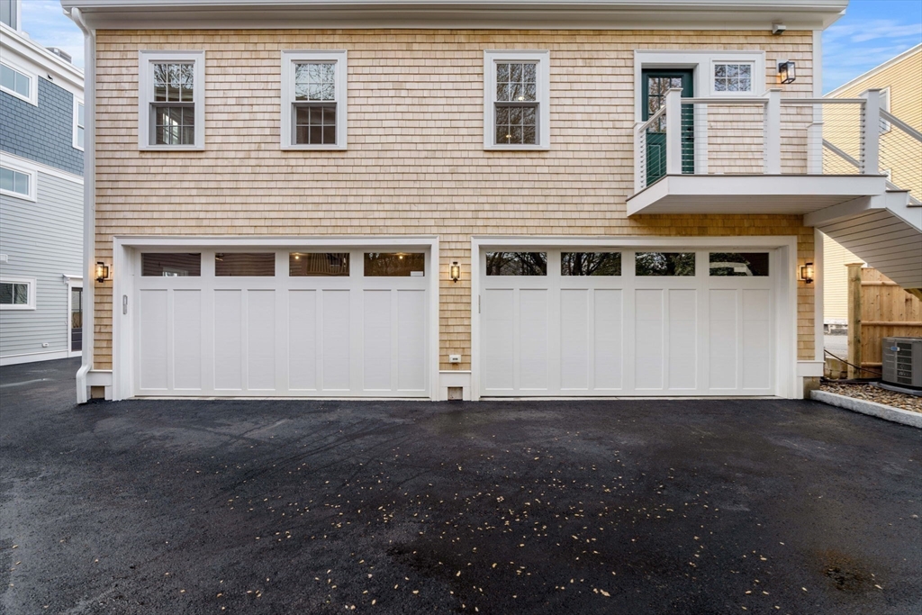 143 Derby Street, Unit 1 Salem, MA 01970 - Photo 2 of 42 a view of a house with a yard