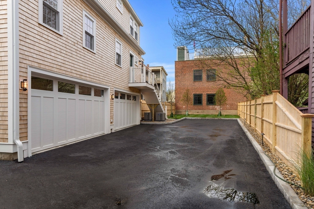 143 Derby Street, Unit 1 Salem, MA 01970 - Photo 38 of 42 a view of a house with a street