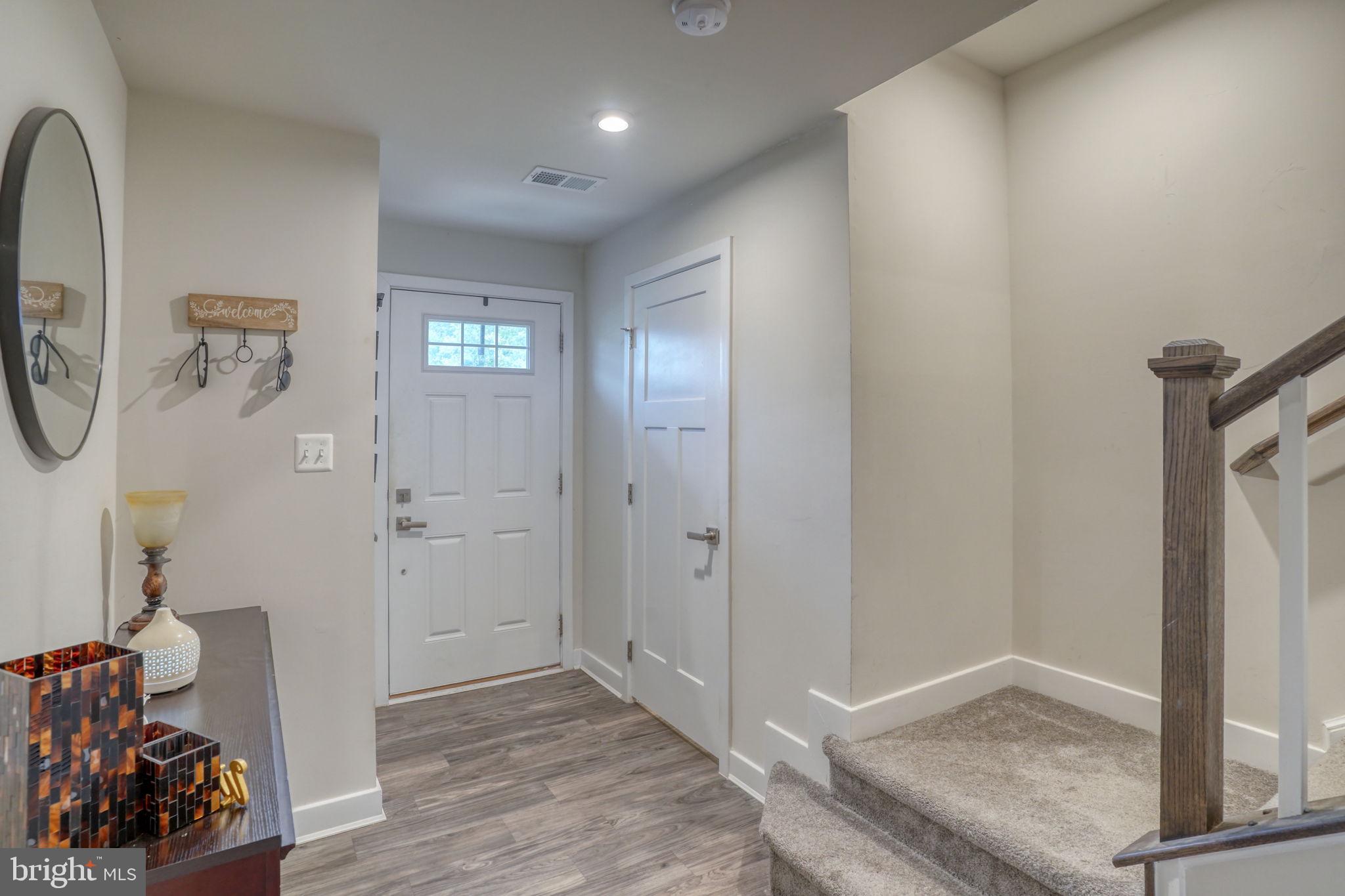 1944 Spearfish Court Newark, DE 19702 - Photo 11 of 44 a view of a hallway with bathroom