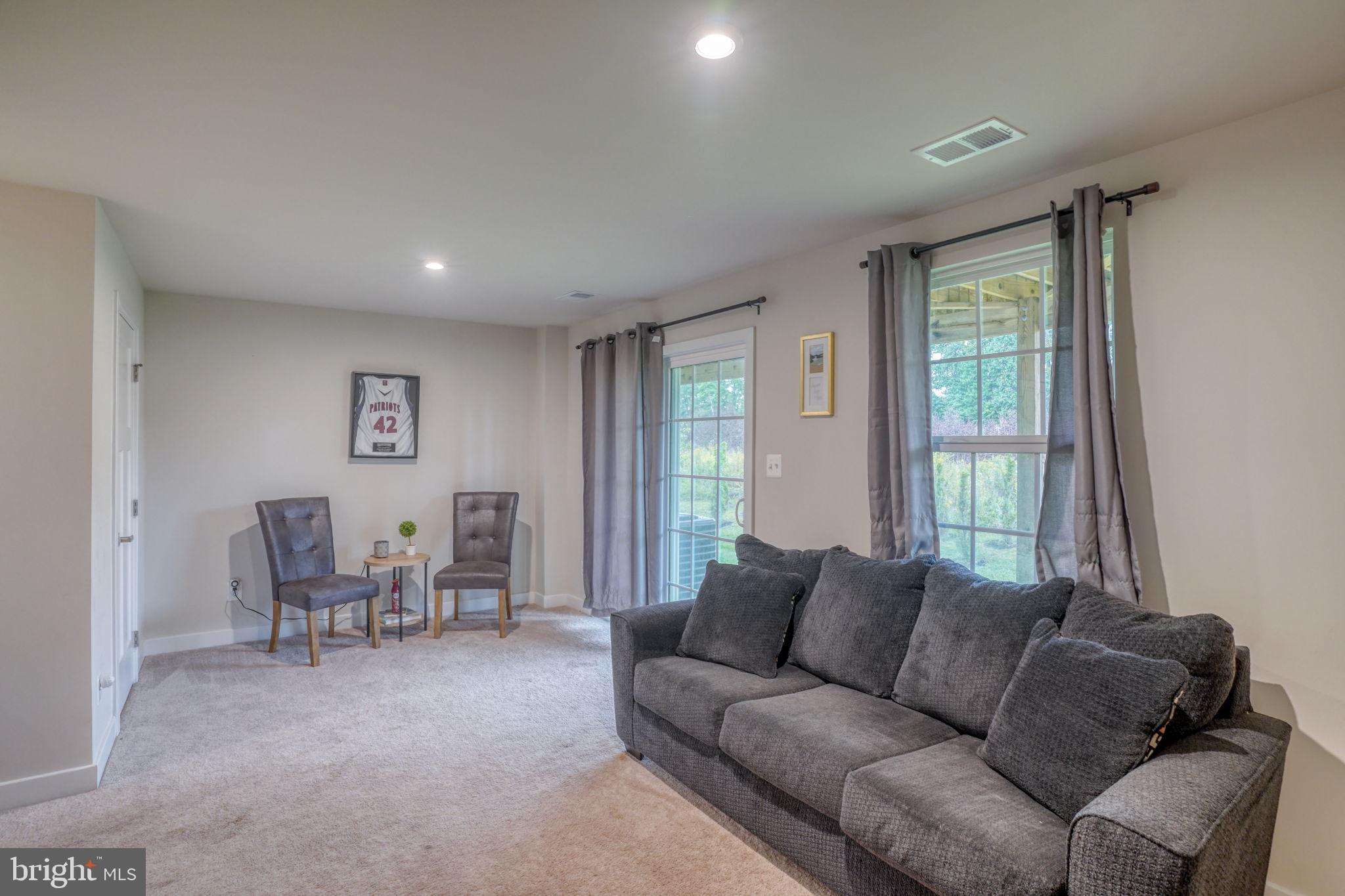 1944 Spearfish Court Newark, DE 19702 - Photo 12 of 44 a living room with furniture and a window