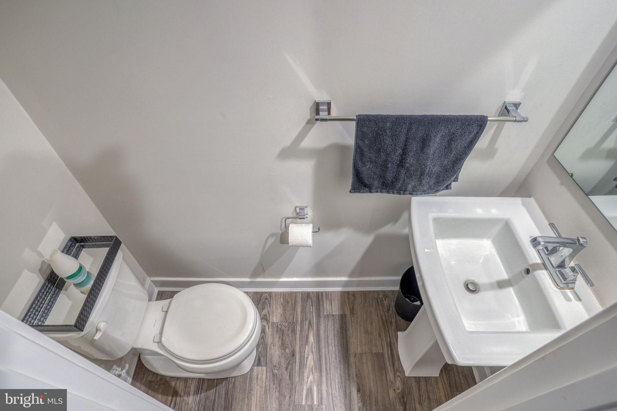 1944 Spearfish Court Newark, DE 19702 - Photo 15 of 44 a bathroom with a sink and a mirror
