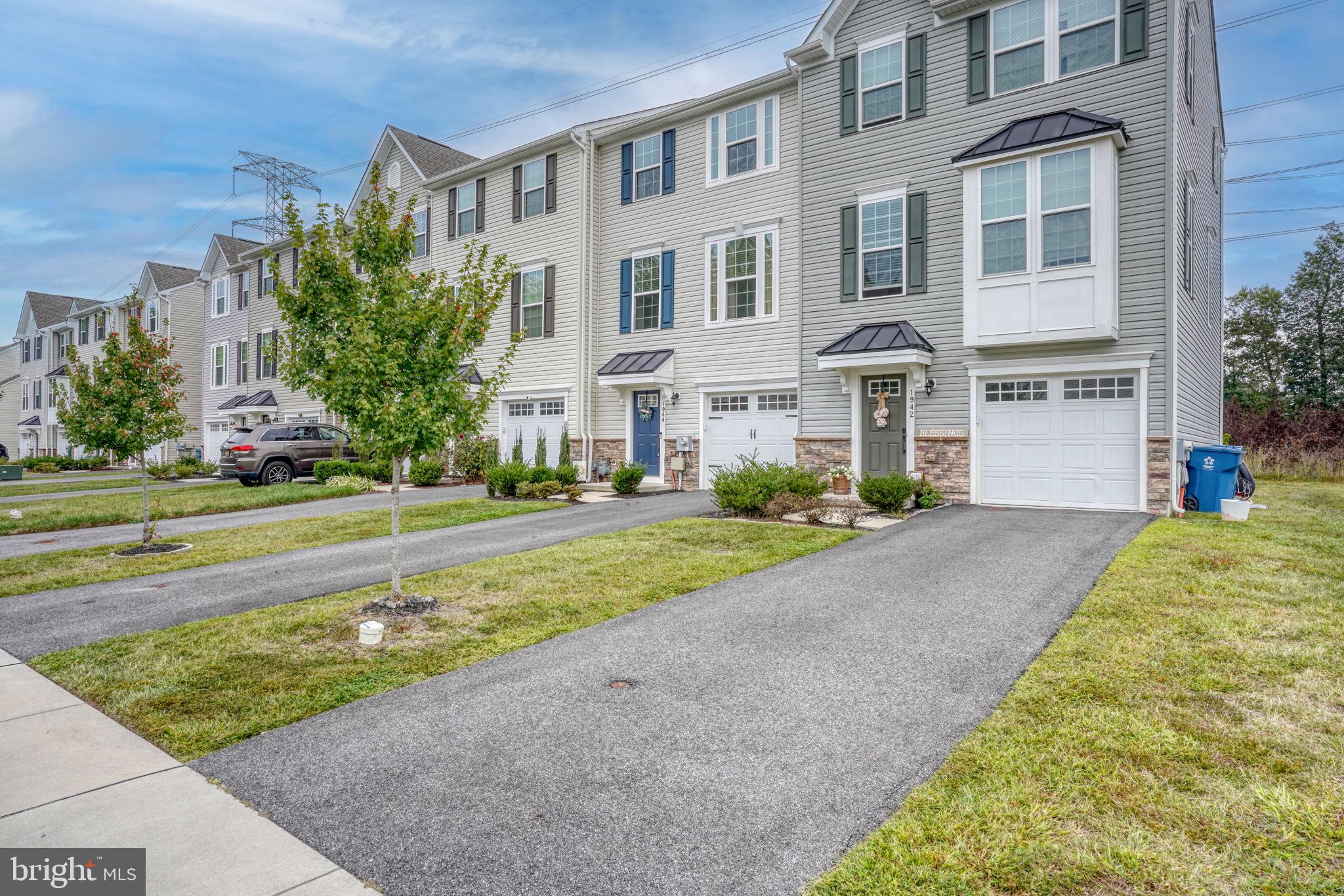 1944 Spearfish Court Newark, DE 19702 - Photo 2 of 44 a front view of a house with a yard