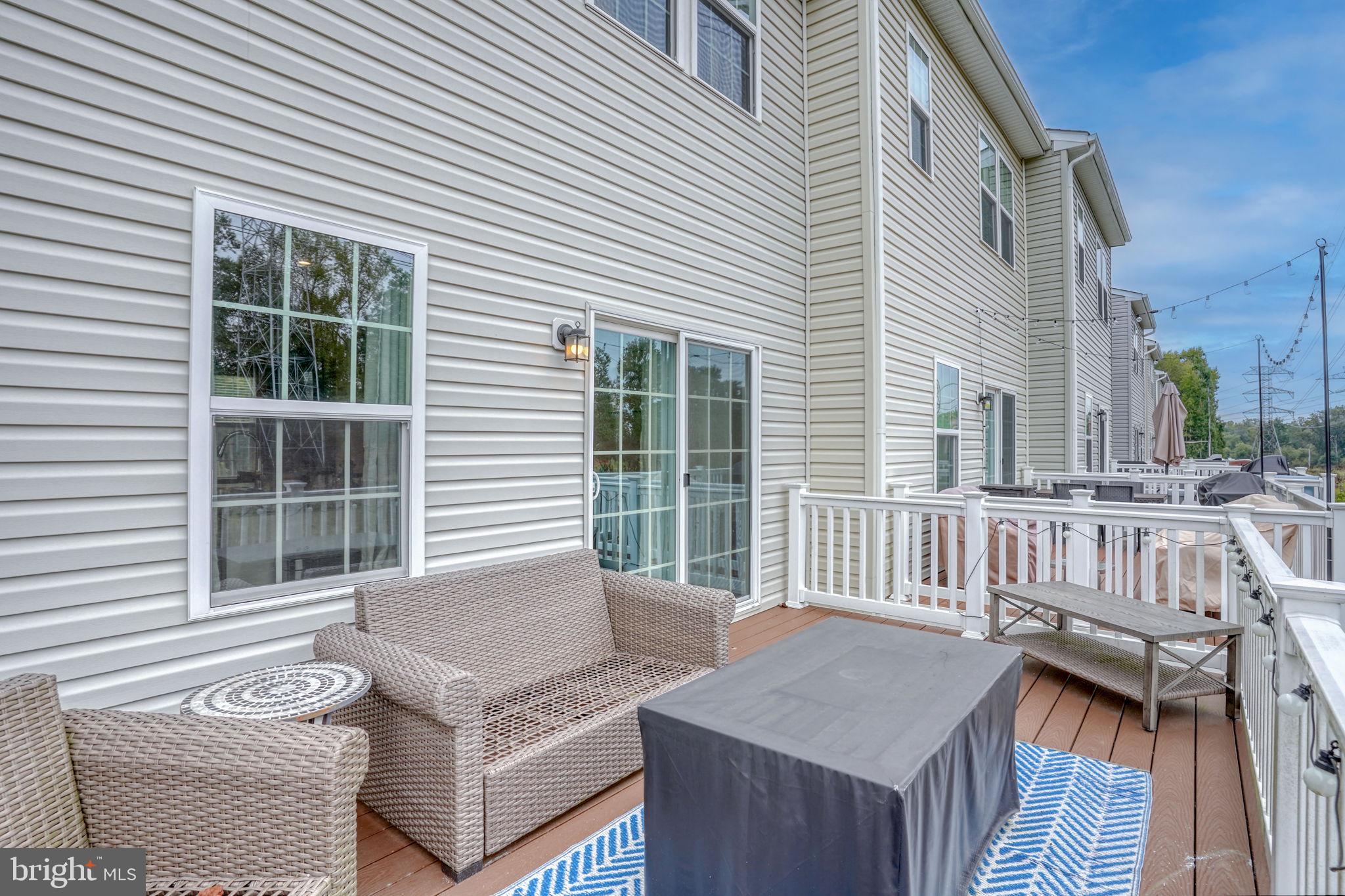 1944 Spearfish Court Newark, DE 19702 - Photo 30 of 44 a view of a patio with a table and chairs