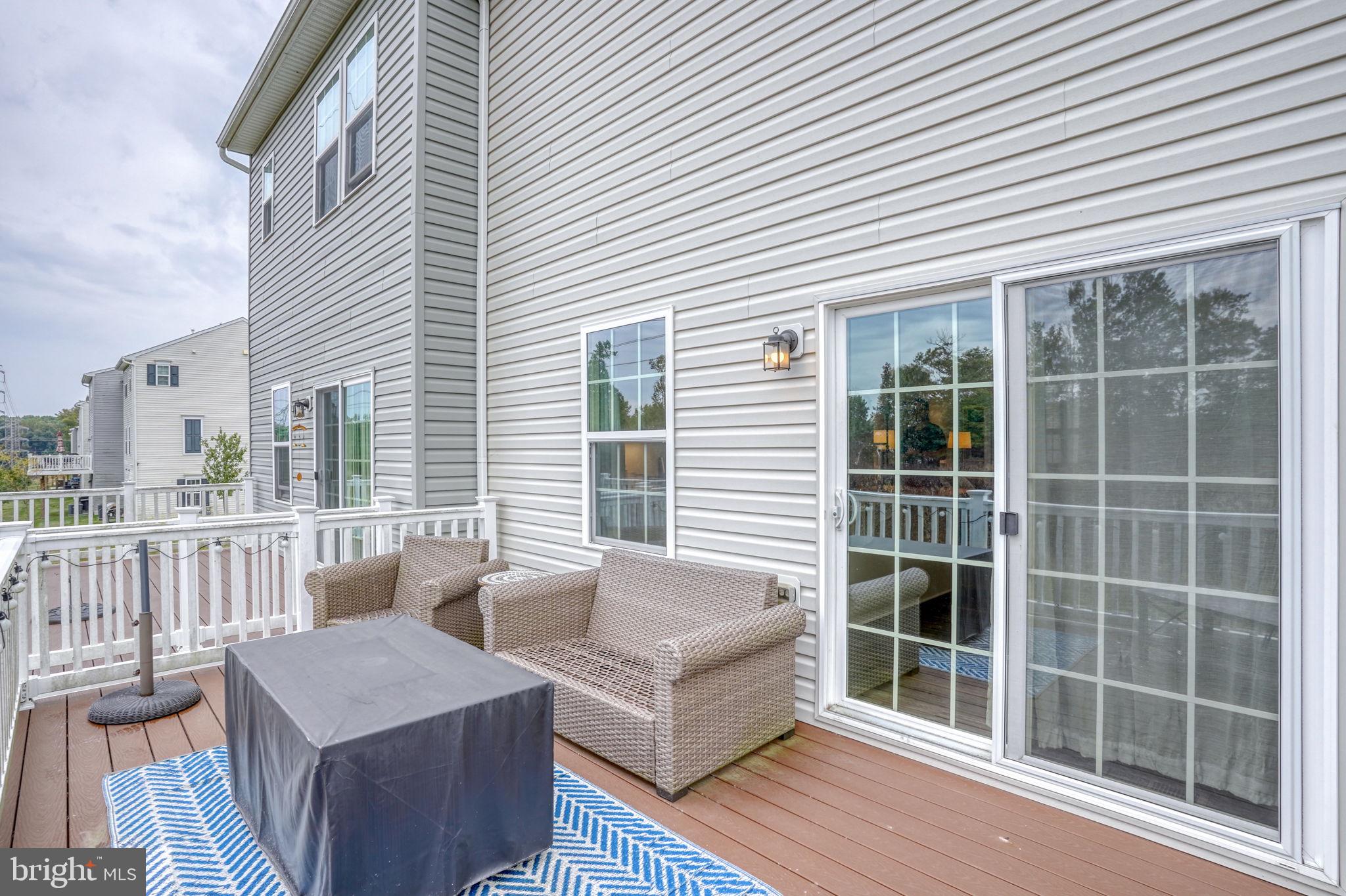1944 Spearfish Court Newark, DE 19702 - Photo 31 of 44 a view of a house with a large window and wooden floor