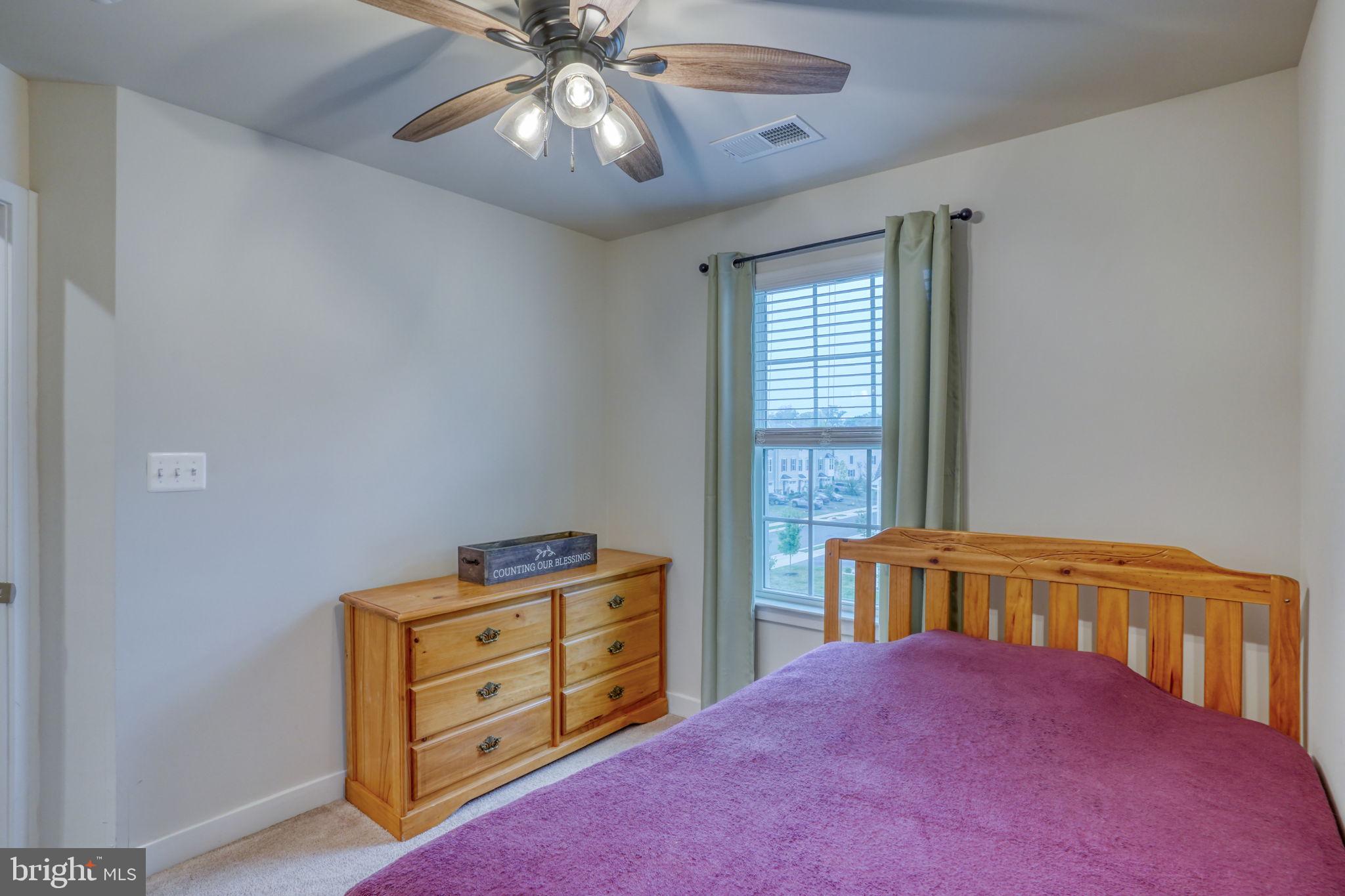 1944 Spearfish Court Newark, DE 19702 - Photo 39 of 44 a bedroom with furniture and a window