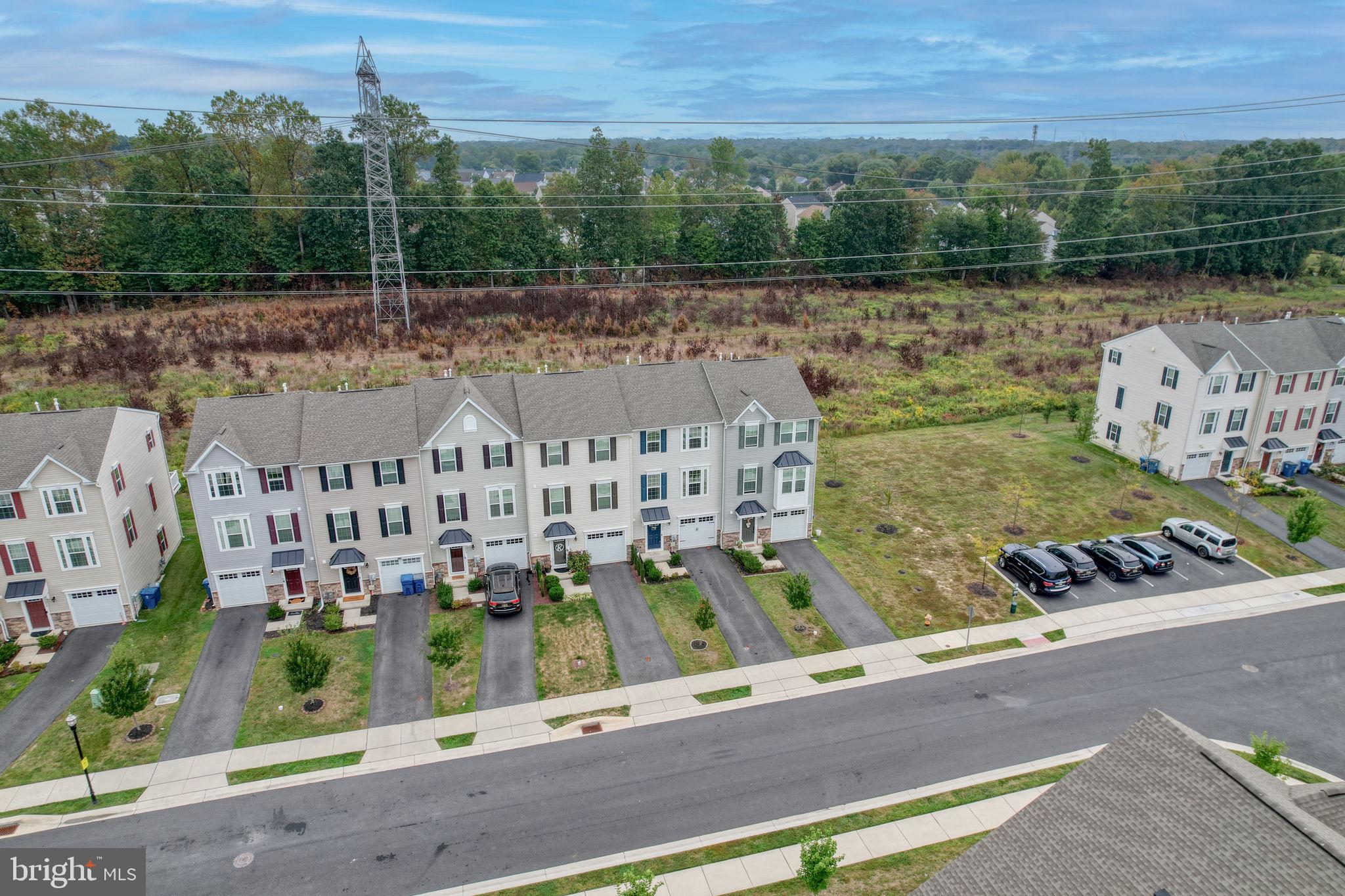 1944 Spearfish Court Newark, DE 19702 - Photo 44 of 44 an aerial view of a house with a garden and lake view