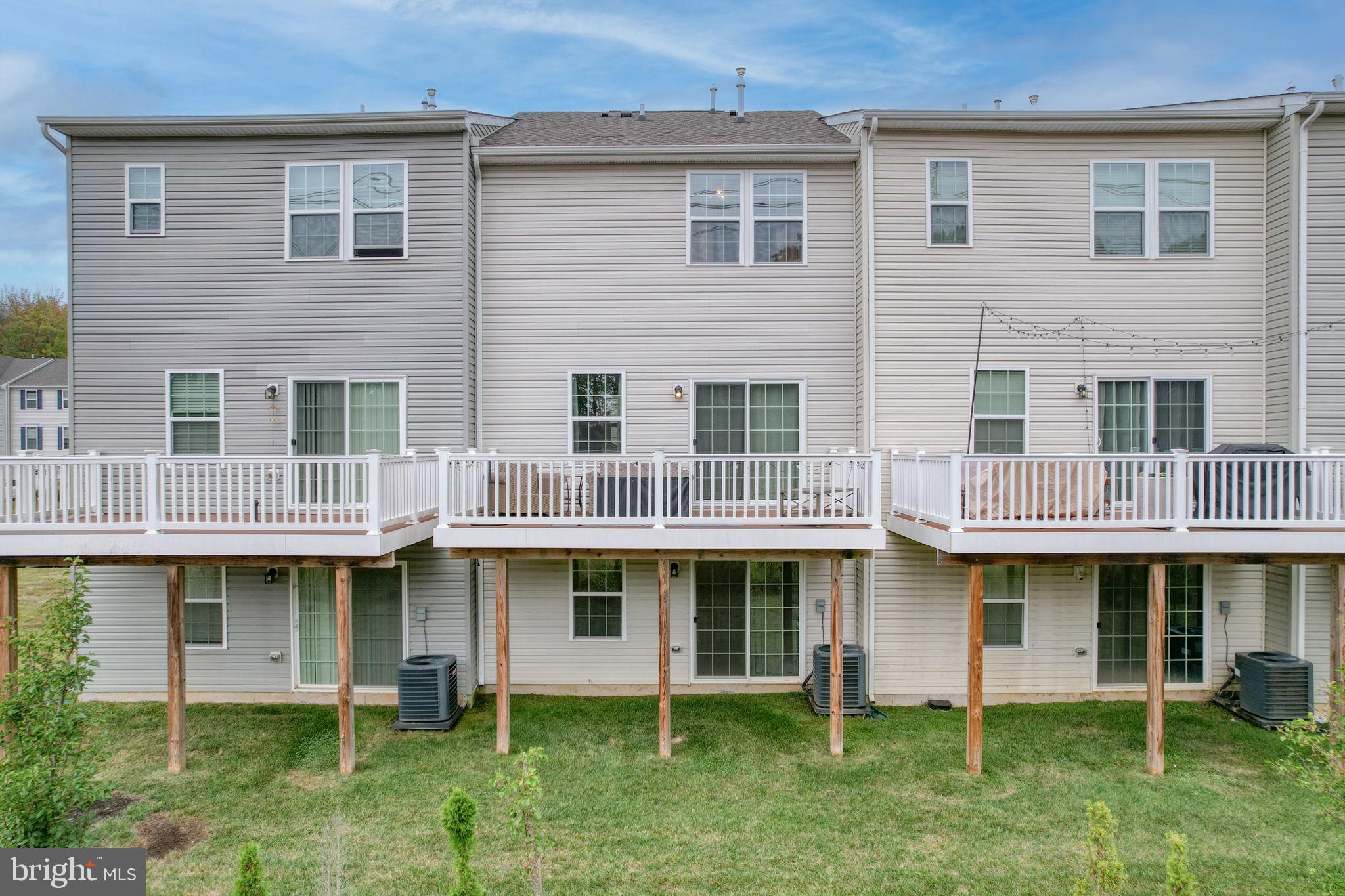 1944 Spearfish Court Newark, DE 19702 - Photo 6 of 44 a view of a yard with seating space and trampoline