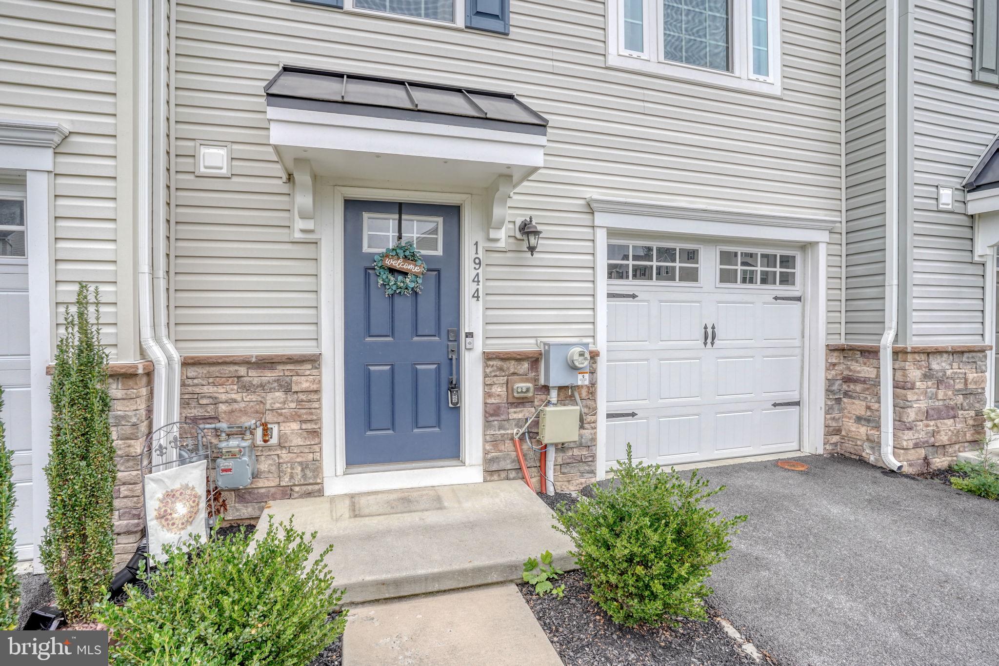 1944 Spearfish Court Newark, DE 19702 - Photo 8 of 44 a front view of a house with a garage