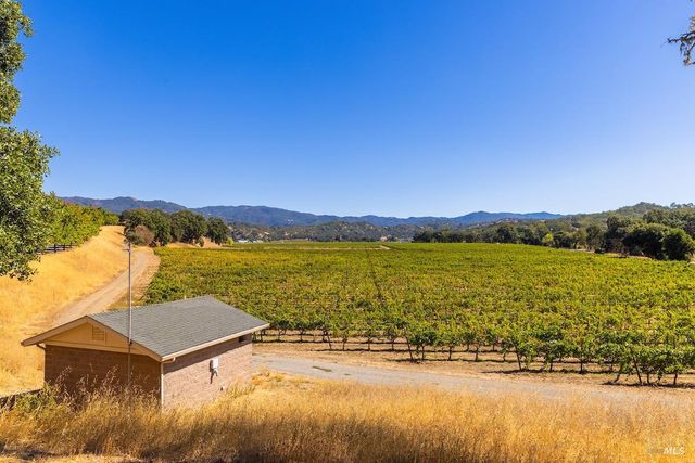 a view of a lake with a outdoor space