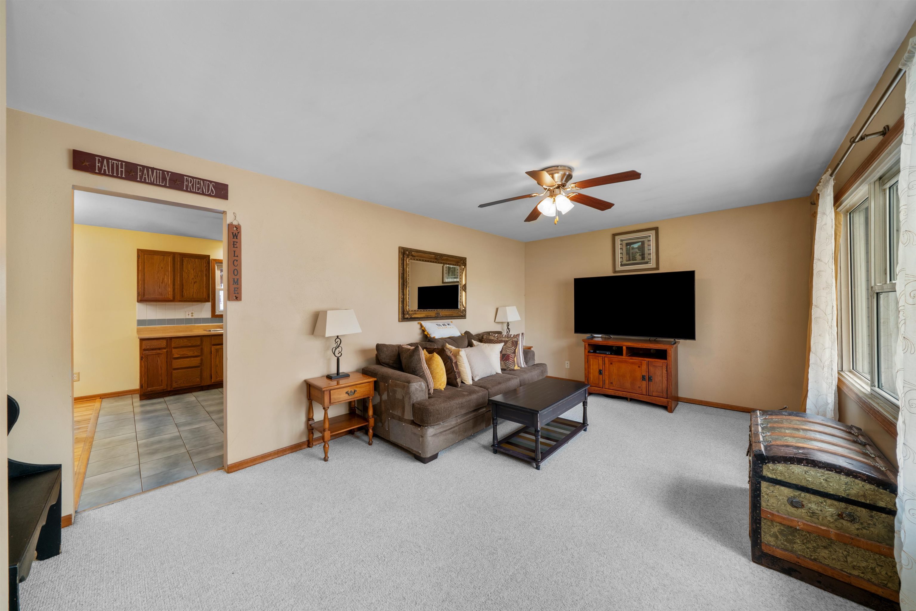 924 Suzy Street Sandwich, IL 60548 - Photo 2 of 48 a living room with furniture and a flat screen tv