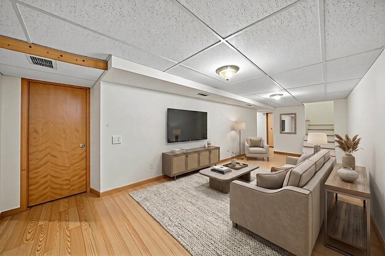 924 Suzy Street Sandwich, IL 60548 - Photo 23 of 48 a living room with furniture and a flat screen tv