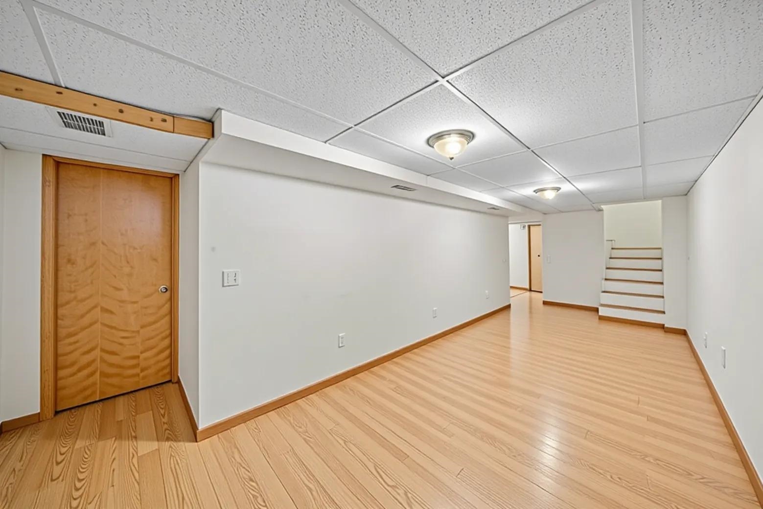 924 Suzy Street Sandwich, IL 60548 - Photo 24 of 48 a view of empty room with wooden floor