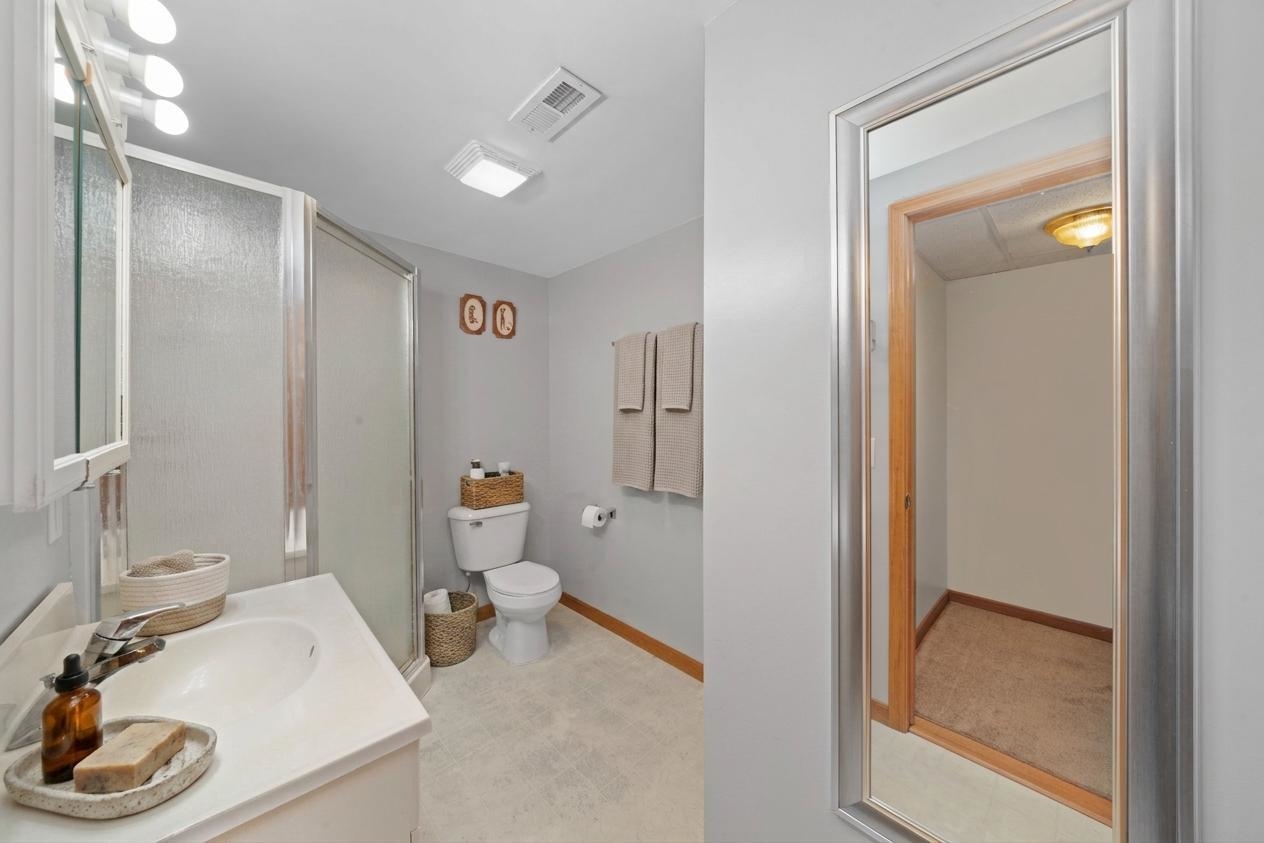 924 Suzy Street Sandwich, IL 60548 - Photo 26 of 48 a very nice looking room with a wooden floor