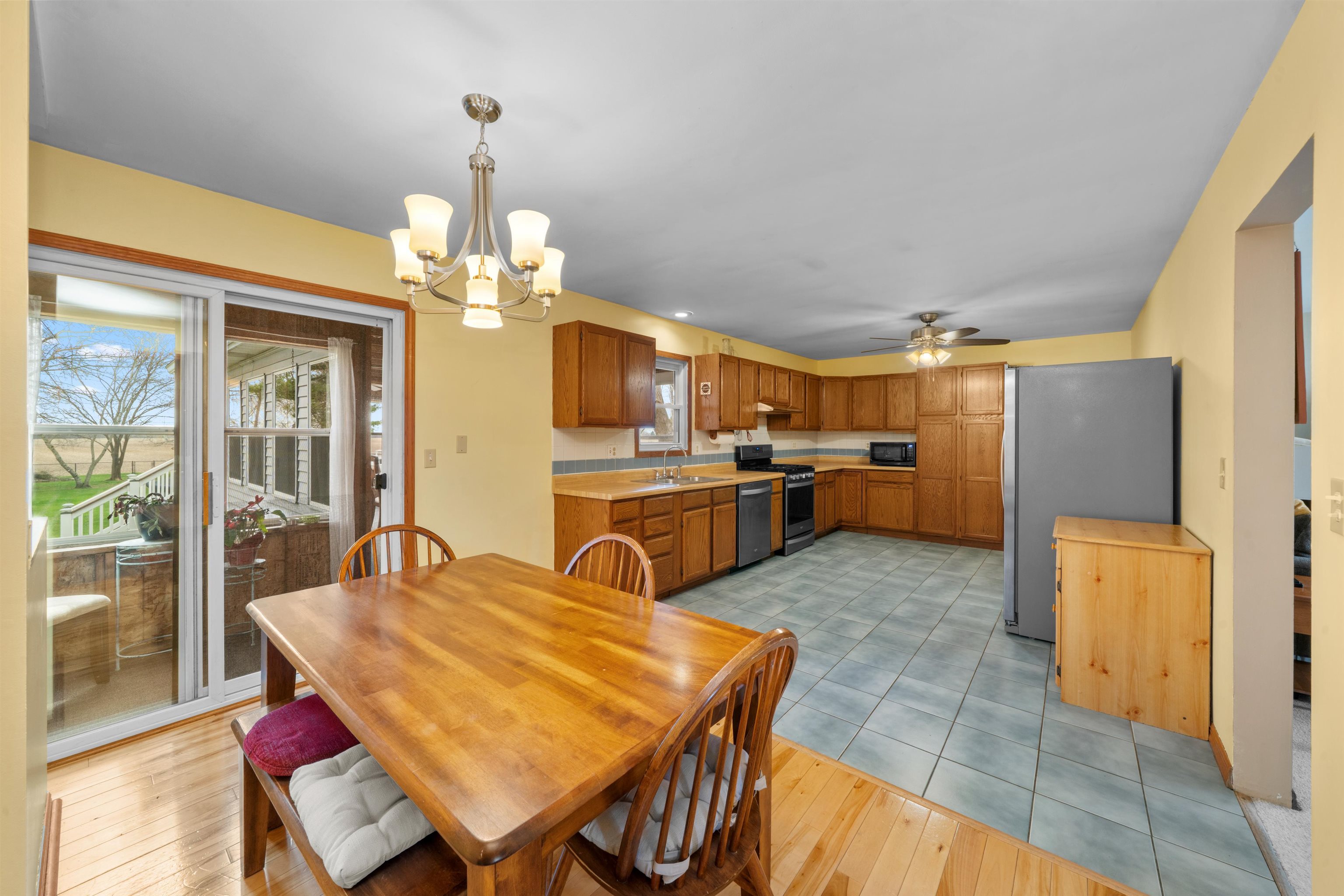 924 Suzy Street Sandwich, IL 60548 - Photo 6 of 48 a view of a dining room with furniture and a chandelier