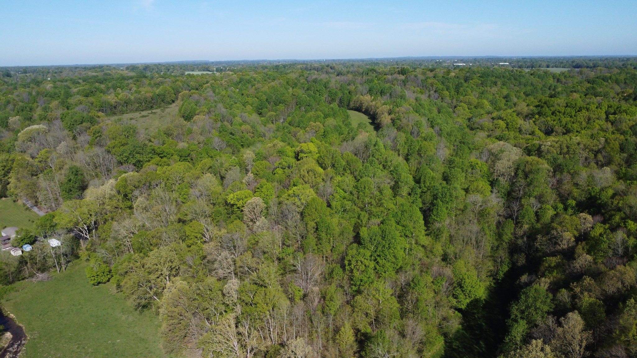 0 Green Valley Road Lafayette, TN 37083 - Photo 24 of 30 a view of a city with lush green forest