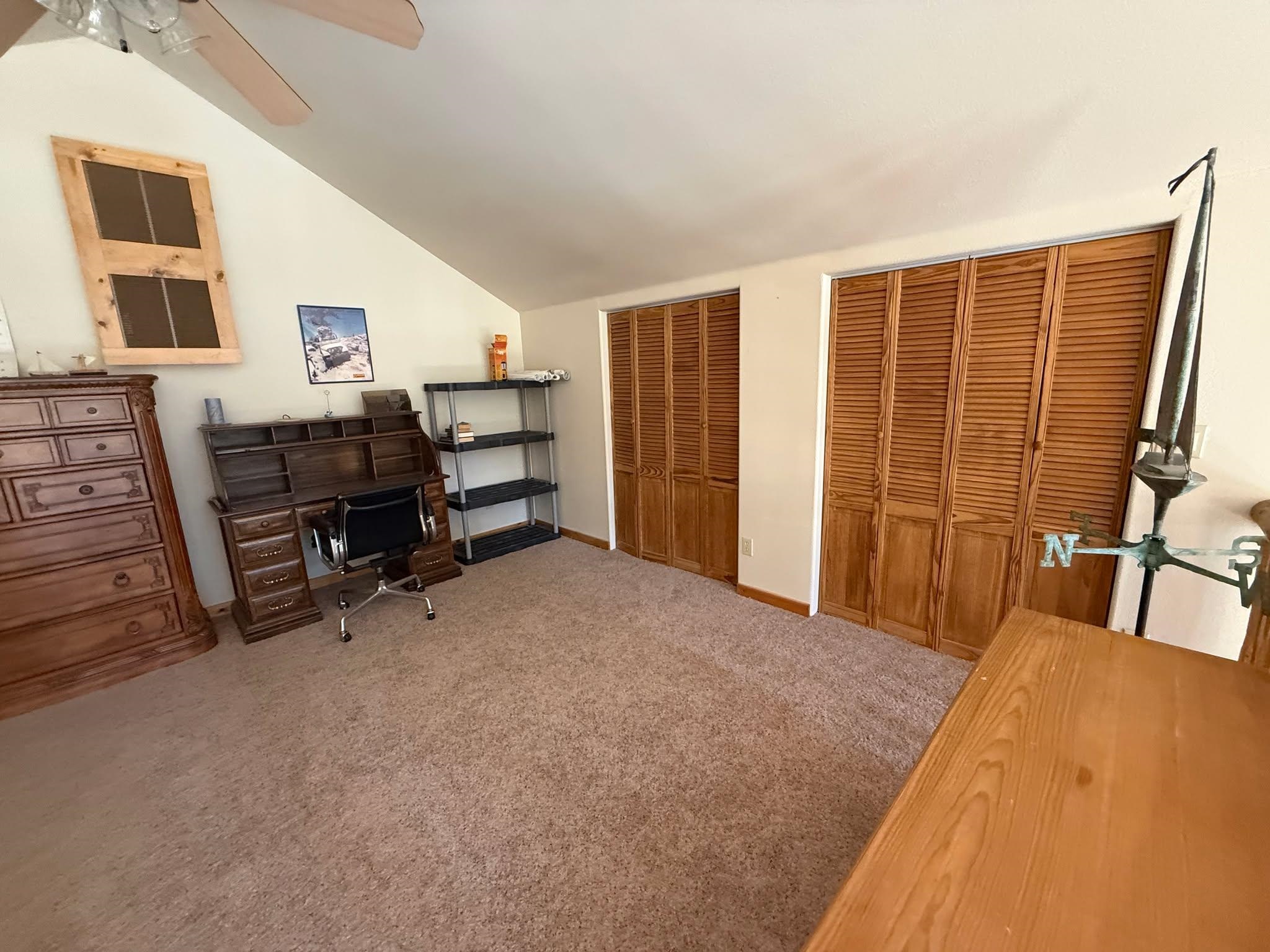 93 Juniper Road Beckwourth, CA 96129 - Photo 14 of 35 a view of a bedroom with furniture and window
