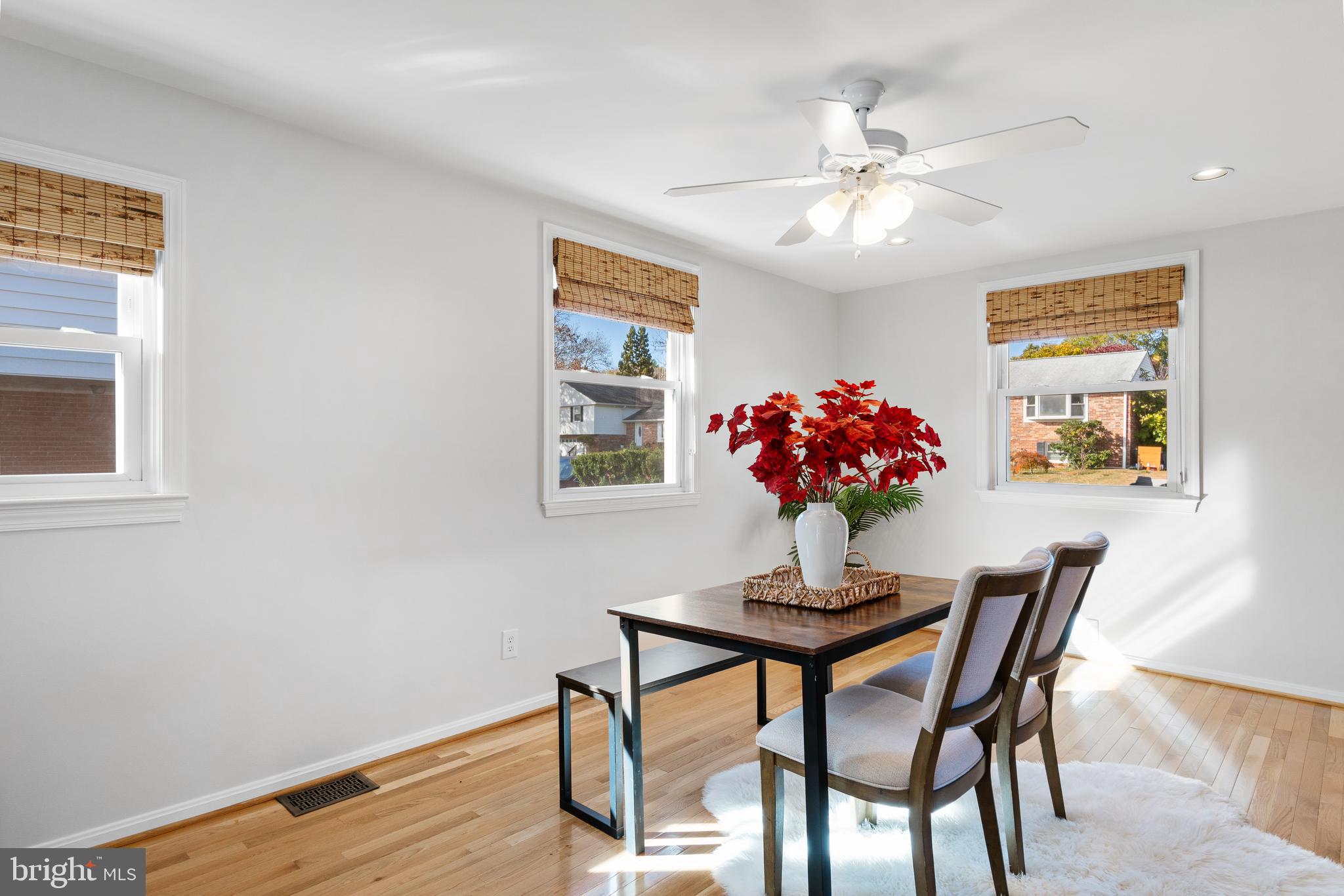 3504 Falling Green Road Olney, MD 20832 - Photo 18 of 54 a dining room with furniture and wooden floor