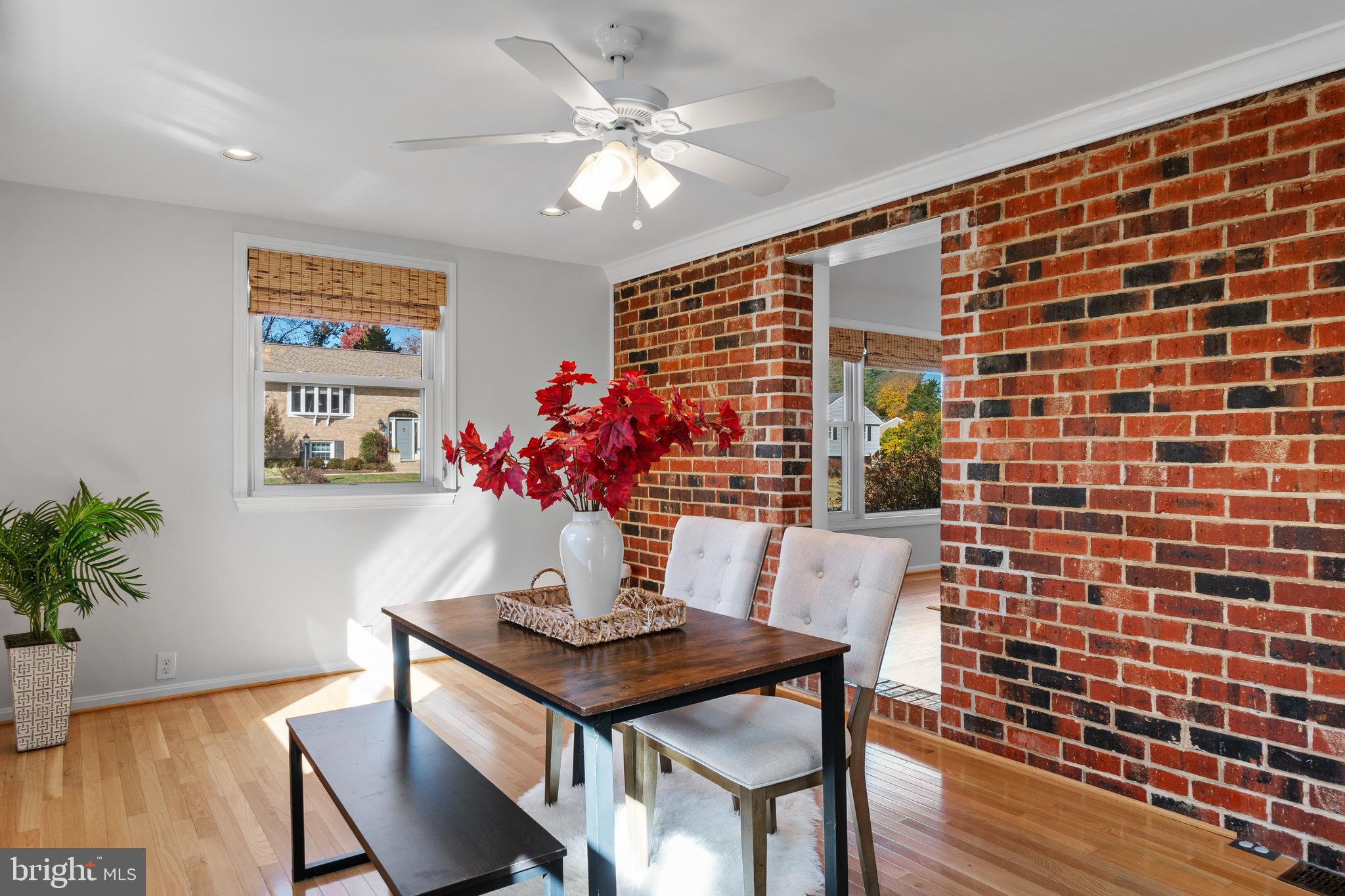 3504 Falling Green Road Olney, MD 20832 - Photo 19 of 54 a view of a dining room with furniture and wooden floor