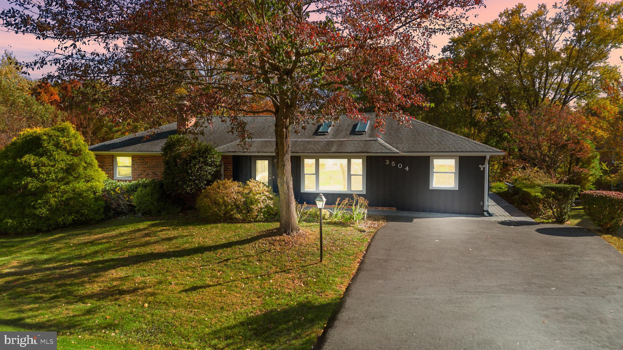 3504 Falling Green Road Olney, MD 20832 - Photo 2 of 54 a front view of a house with a yard and garage