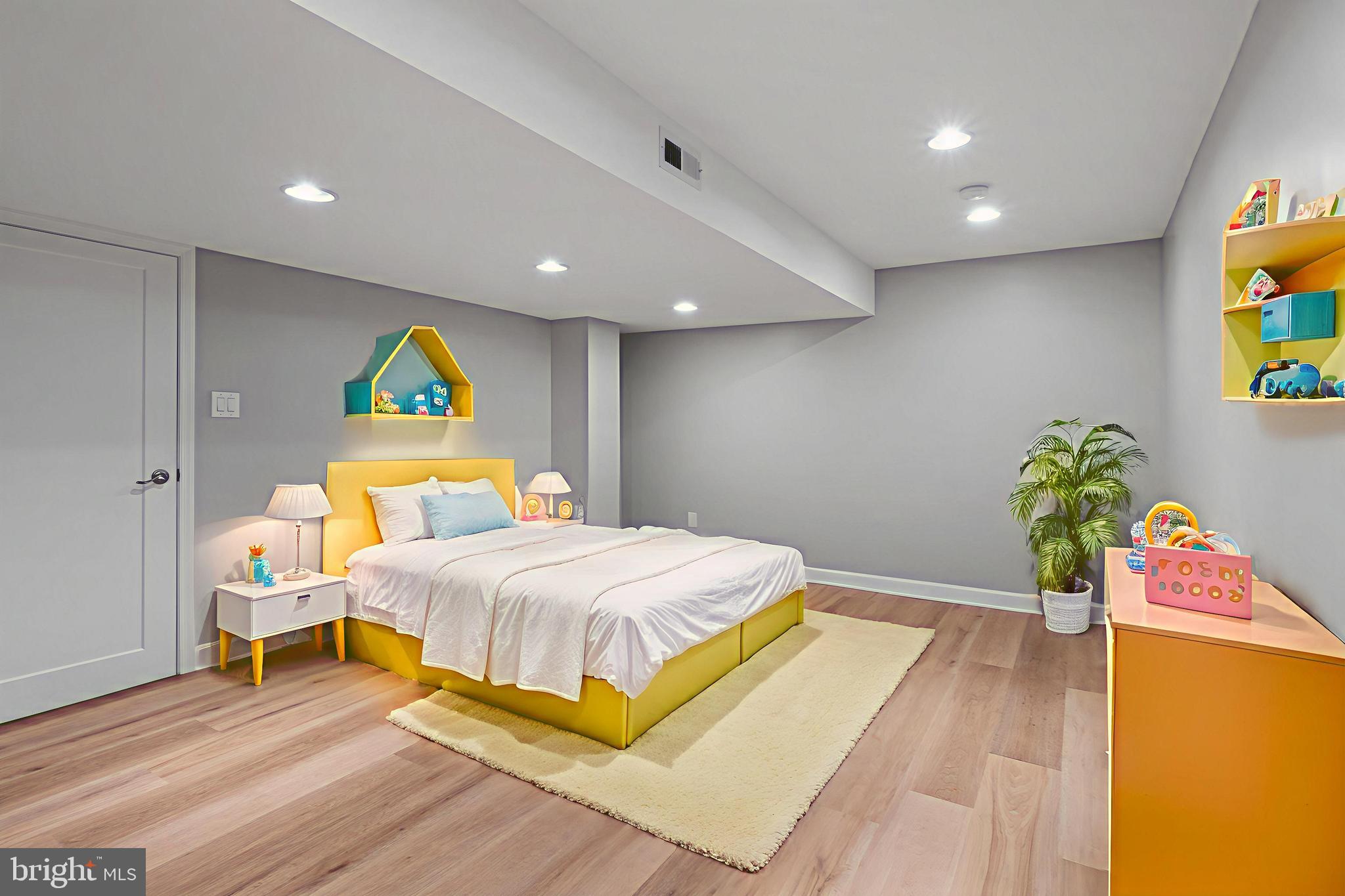 3504 Falling Green Road Olney, MD 20832 - Photo 42 of 54 a bedroom with a bed and a wooden floor