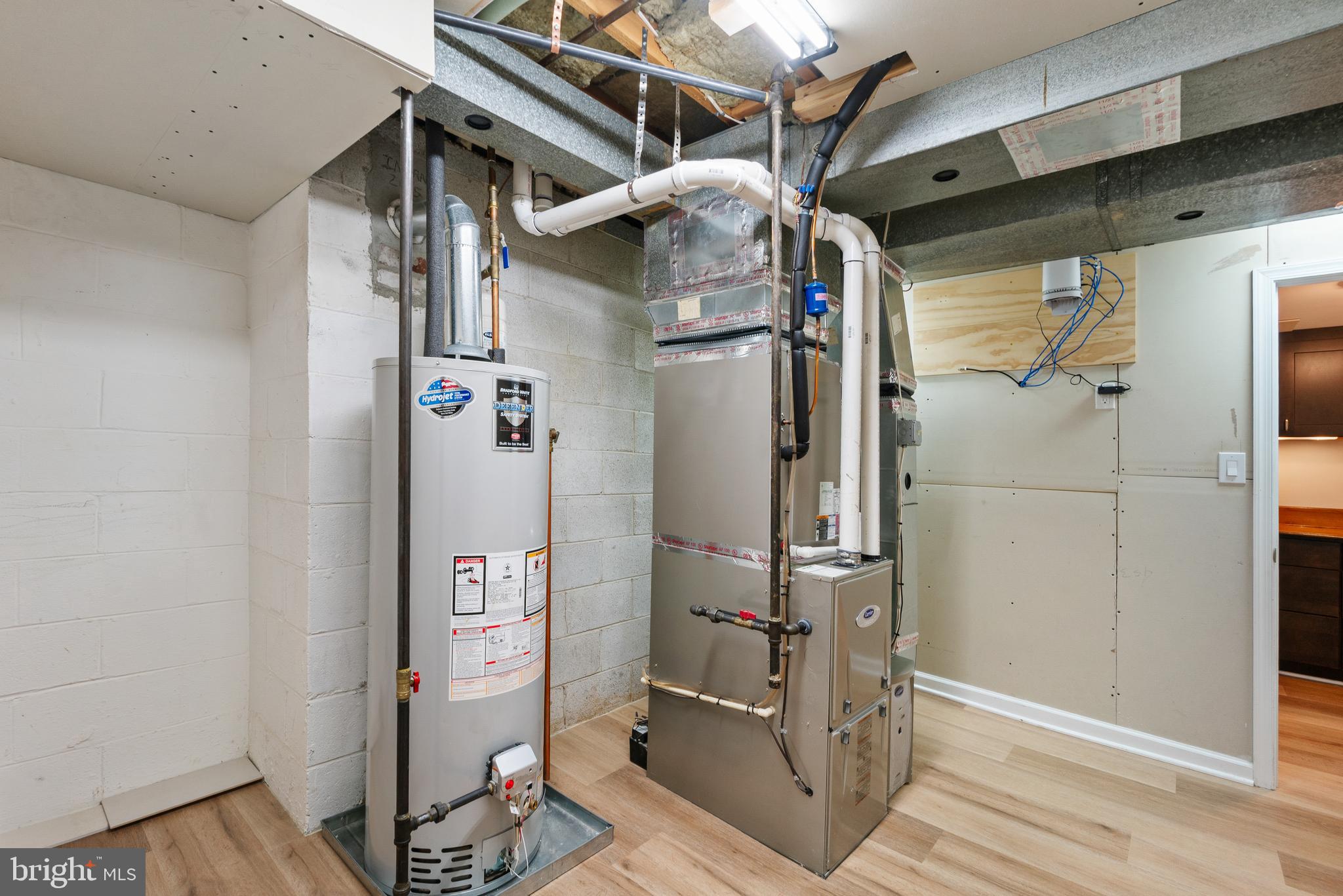 3504 Falling Green Road Olney, MD 20832 - Photo 45 of 54 a view of walk in closet with clothes and shoes