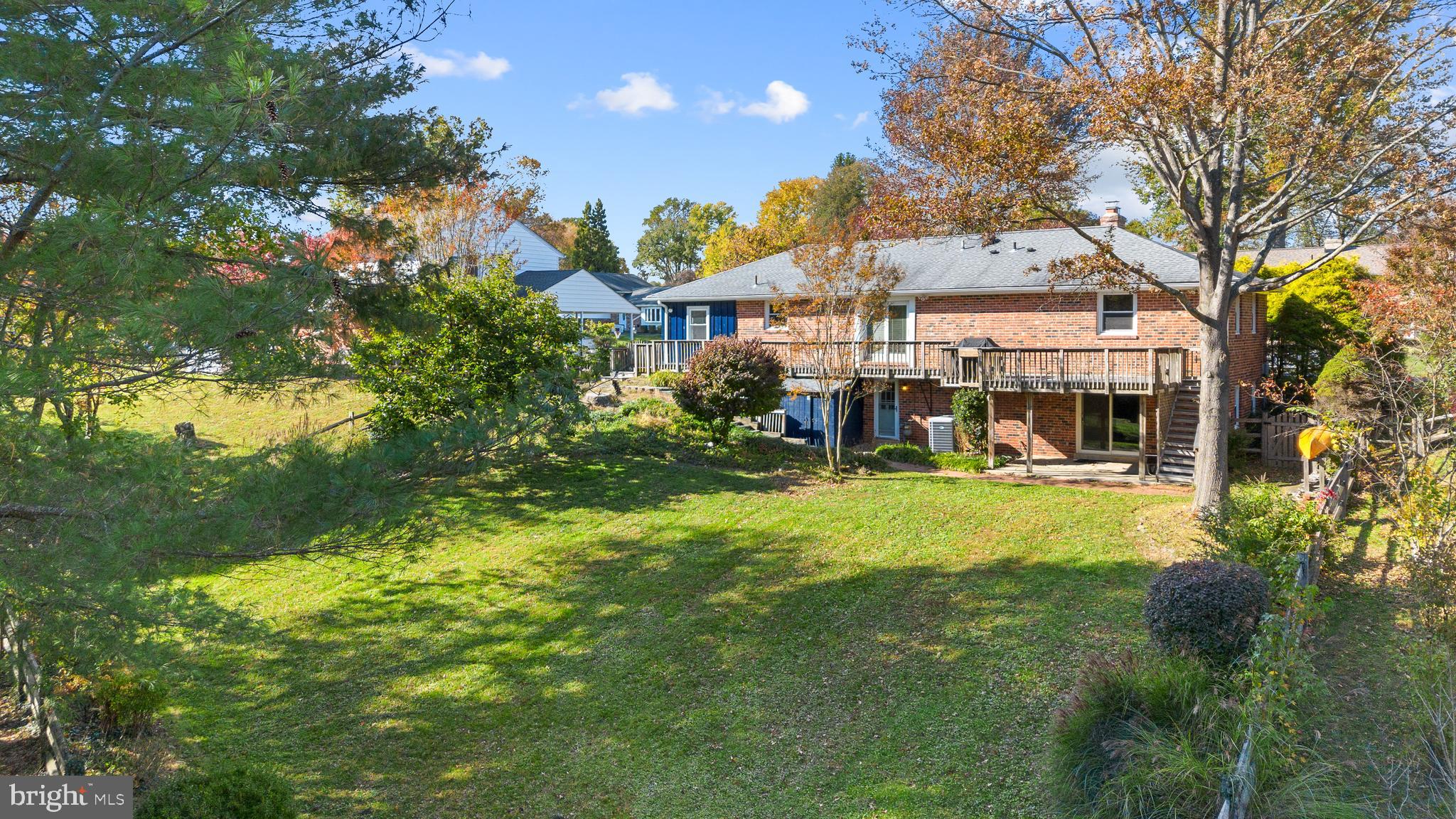 3504 Falling Green Road Olney, MD 20832 - Photo 50 of 54 a front view of a house with a garden