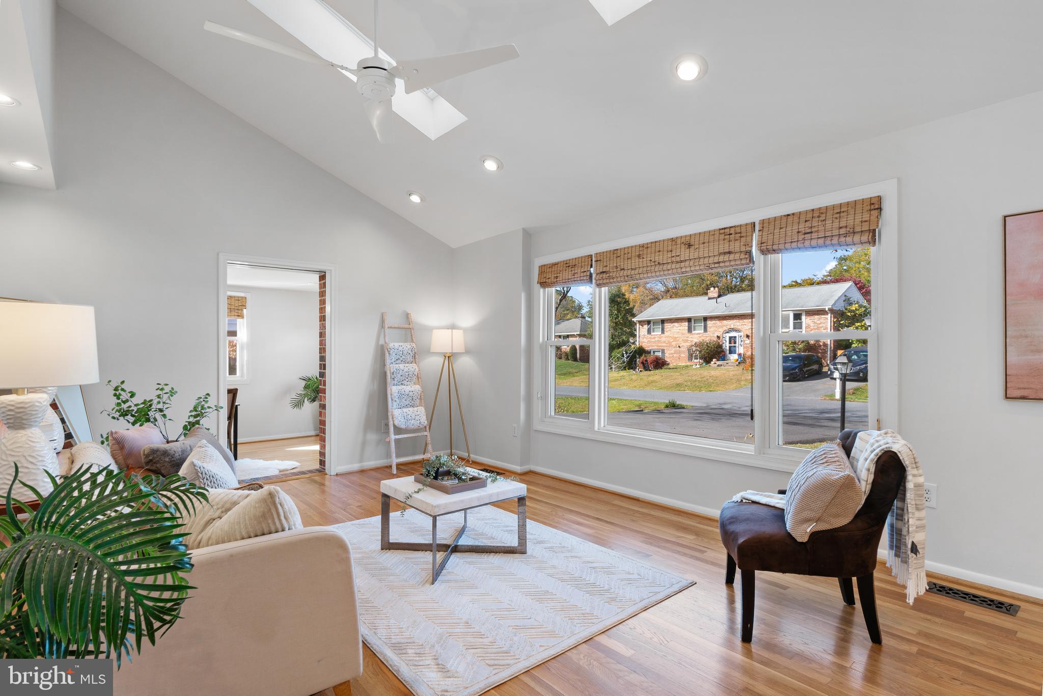 3504 Falling Green Road Olney, MD 20832 - Photo 8 of 54 a living room with furniture and a large window