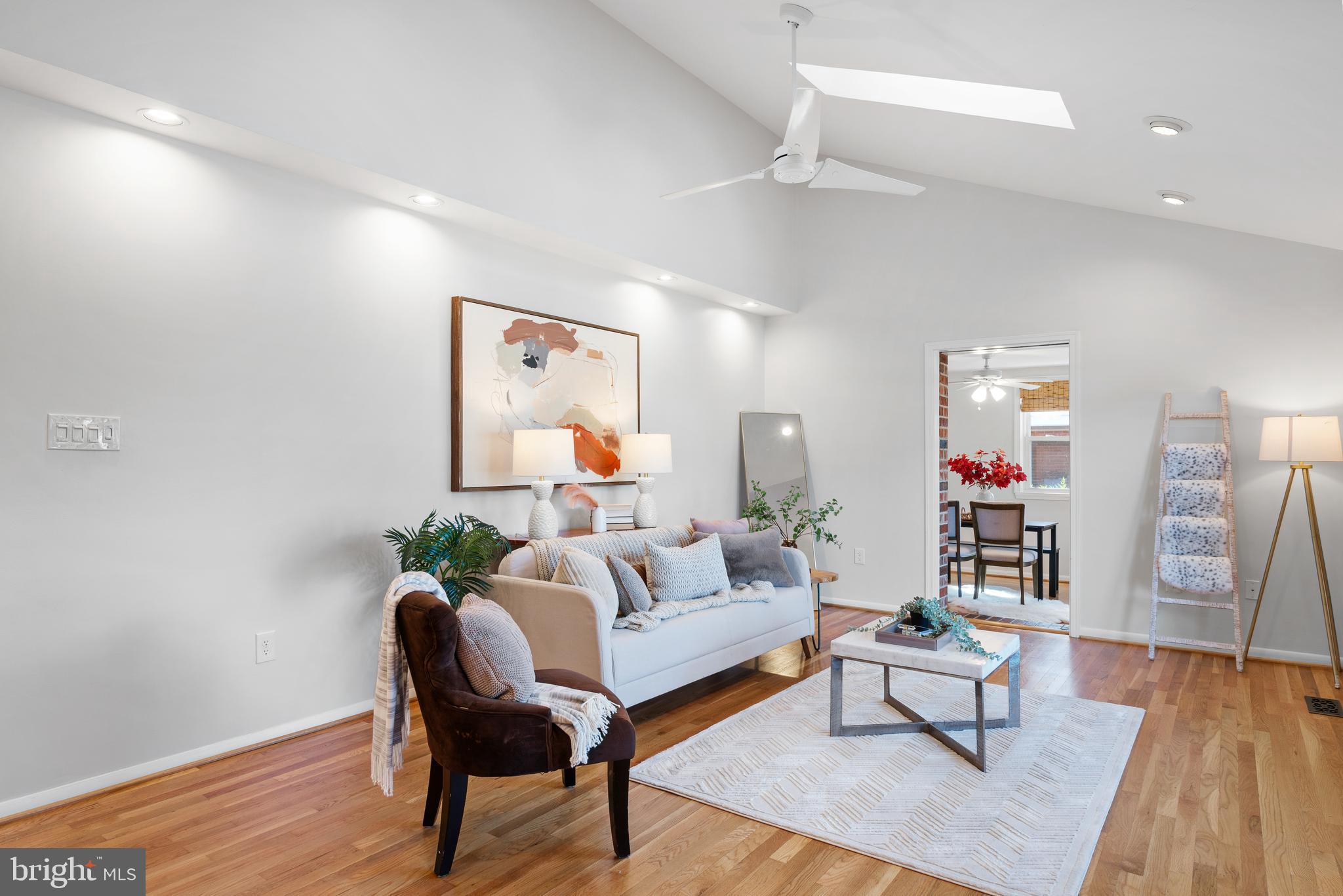 3504 Falling Green Road Olney, MD 20832 - Photo 9 of 54 a living room with furniture and a wooden floor
