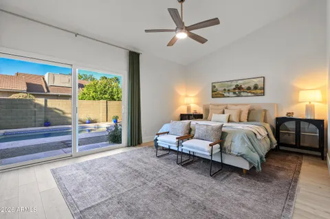 a bed room with a bed and a couch