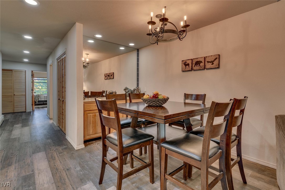 931 Incline Way, Unit 249 Incline Village, NV 89451 - Photo 7 of 21 a view of a dining room with furniture and wooden floor