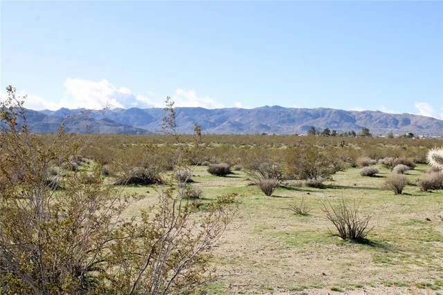 a view of mountain with lake view