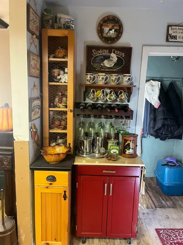 a room with lots of bottles of alcohol