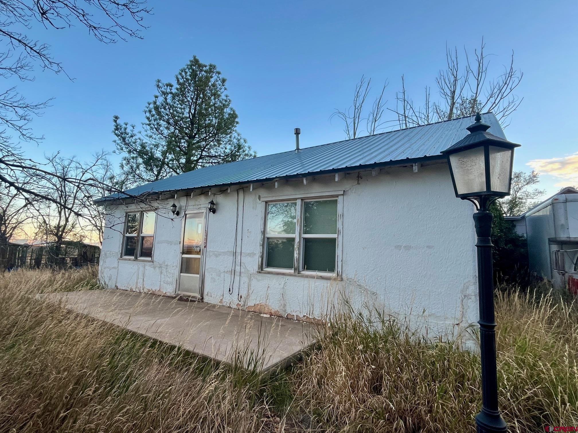 Tbd Tbd 17th Road Yellow Jacket, CO 81335 - Photo 7 of 17 a house view with a outdoor space