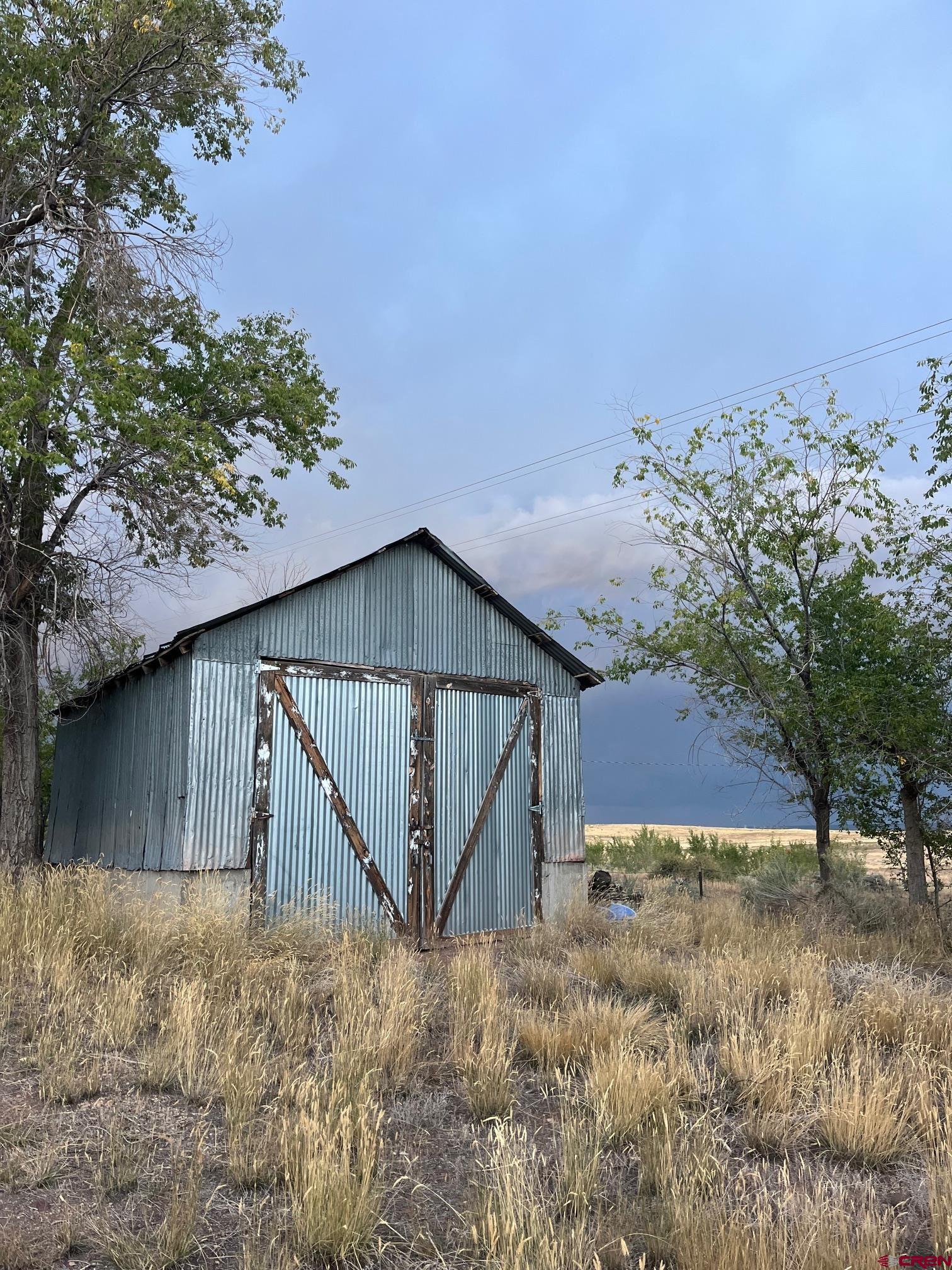Tbd Tbd 17th Road Yellow Jacket, CO 81335 - Photo 8 of 17 a view of backyard of house
