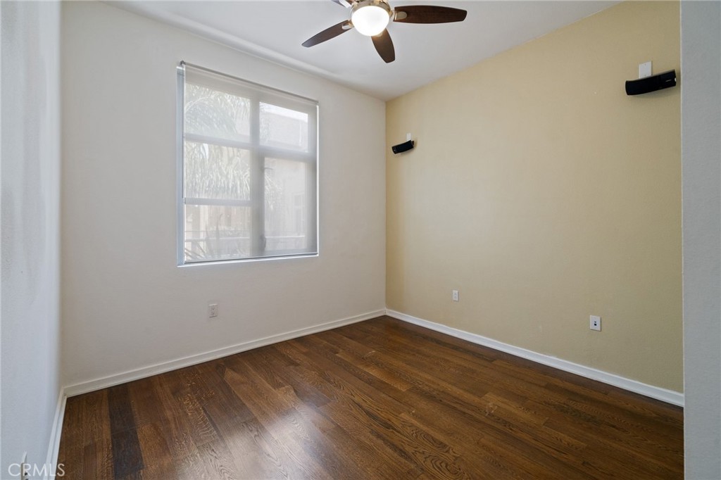 133 The, Unit 404 Long Beach, CA 90802 - Photo 7 of 27 wooden floor in an empty room with a window