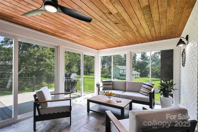 a outdoor living space with furniture and garden view