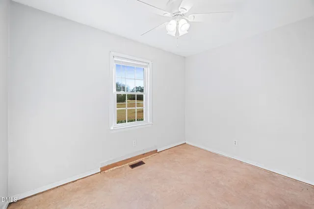 an empty room with a window