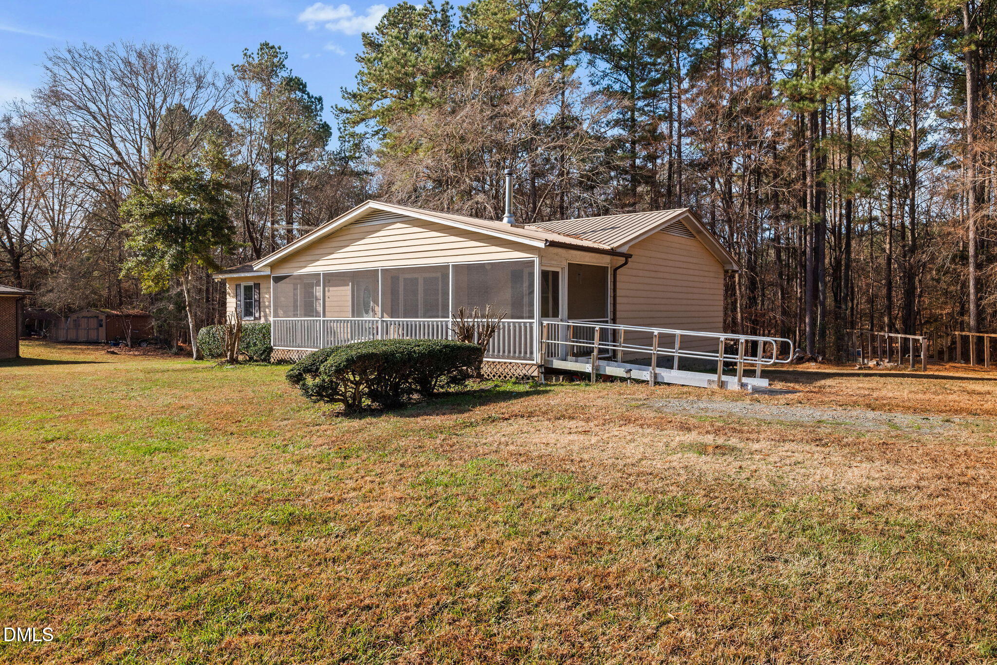1804 Gade Bryant Road Moncure, NC 27559 - Photo 2 of 38 a front view of a house with a yard