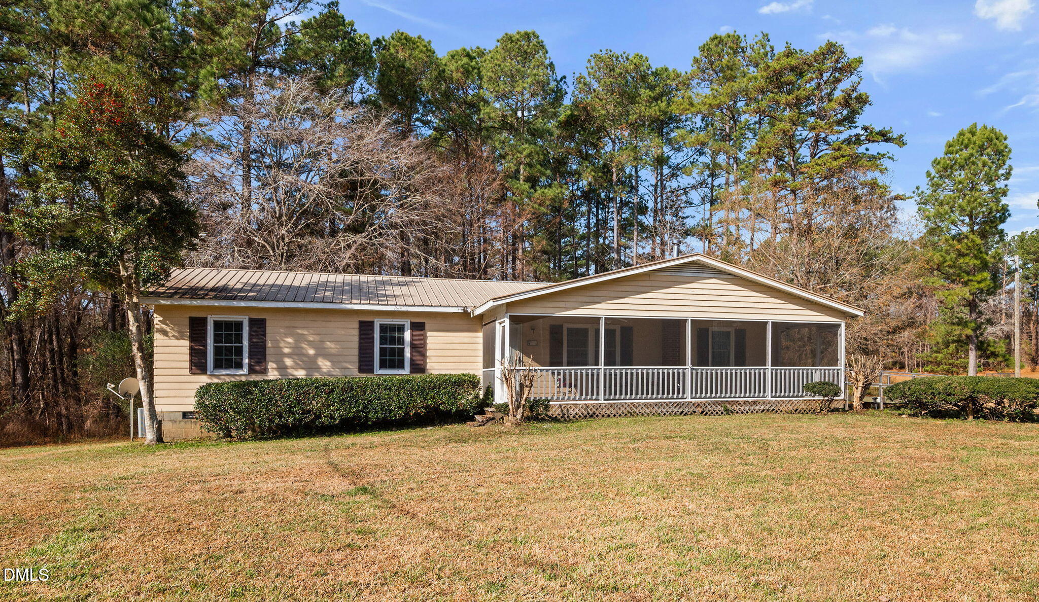 1804 Gade Bryant Road Moncure, NC 27559 - Photo 23 of 38 a front view of a house with a garden