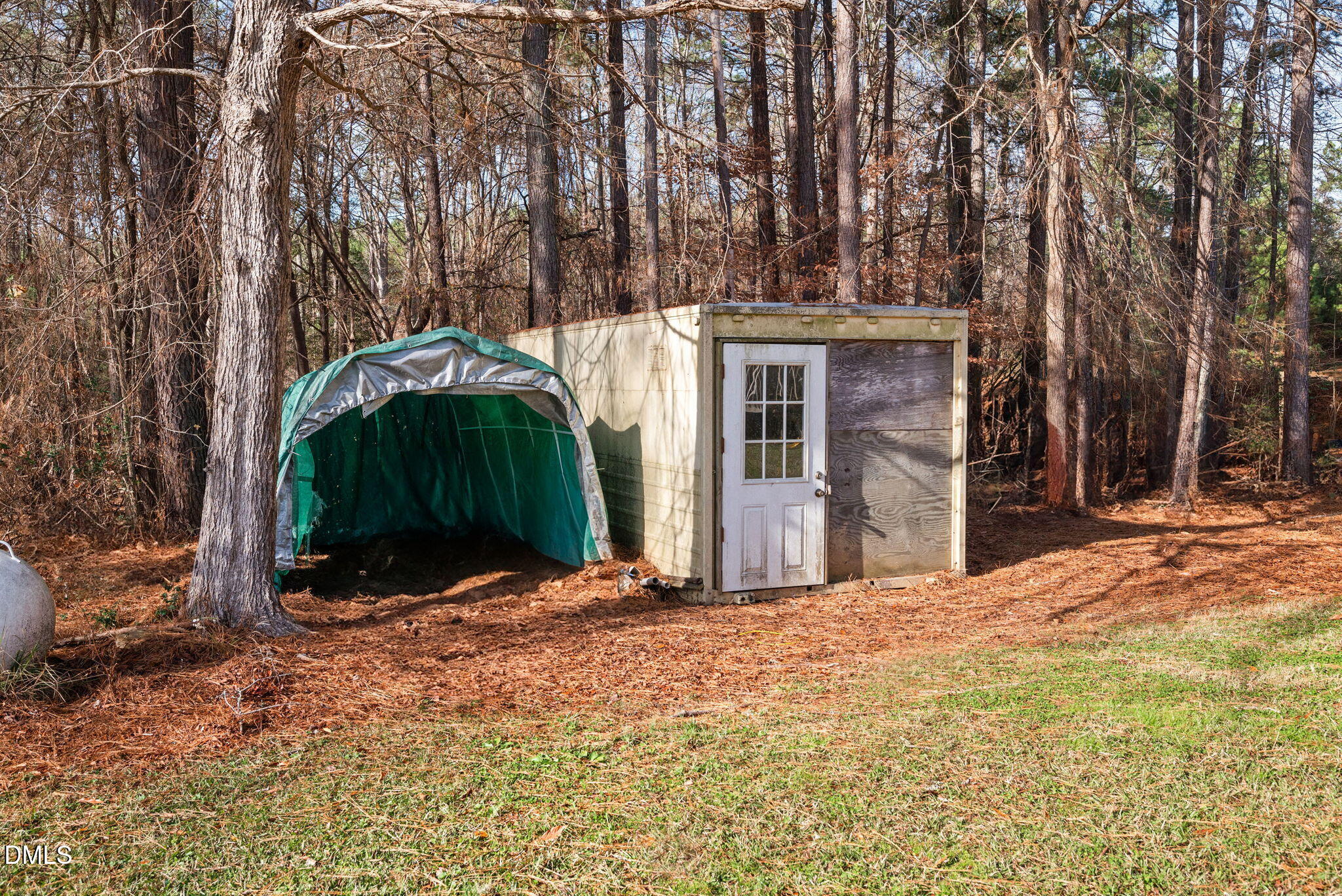 1804 Gade Bryant Road Moncure, NC 27559 - Photo 37 of 38 a backyard of a house with table and chairs