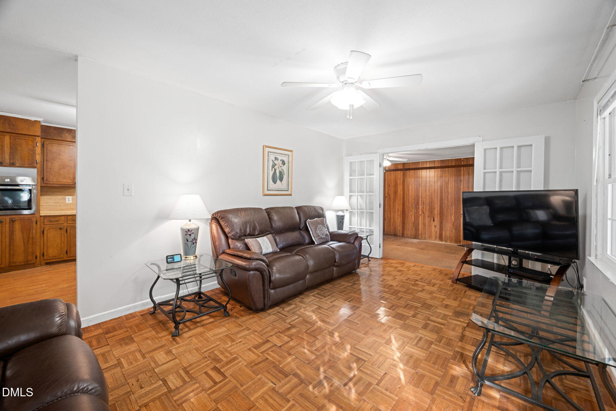 1804 Gade Bryant Road Moncure, NC 27559 - Photo 5 of 38 a living room with furniture and a flat screen tv