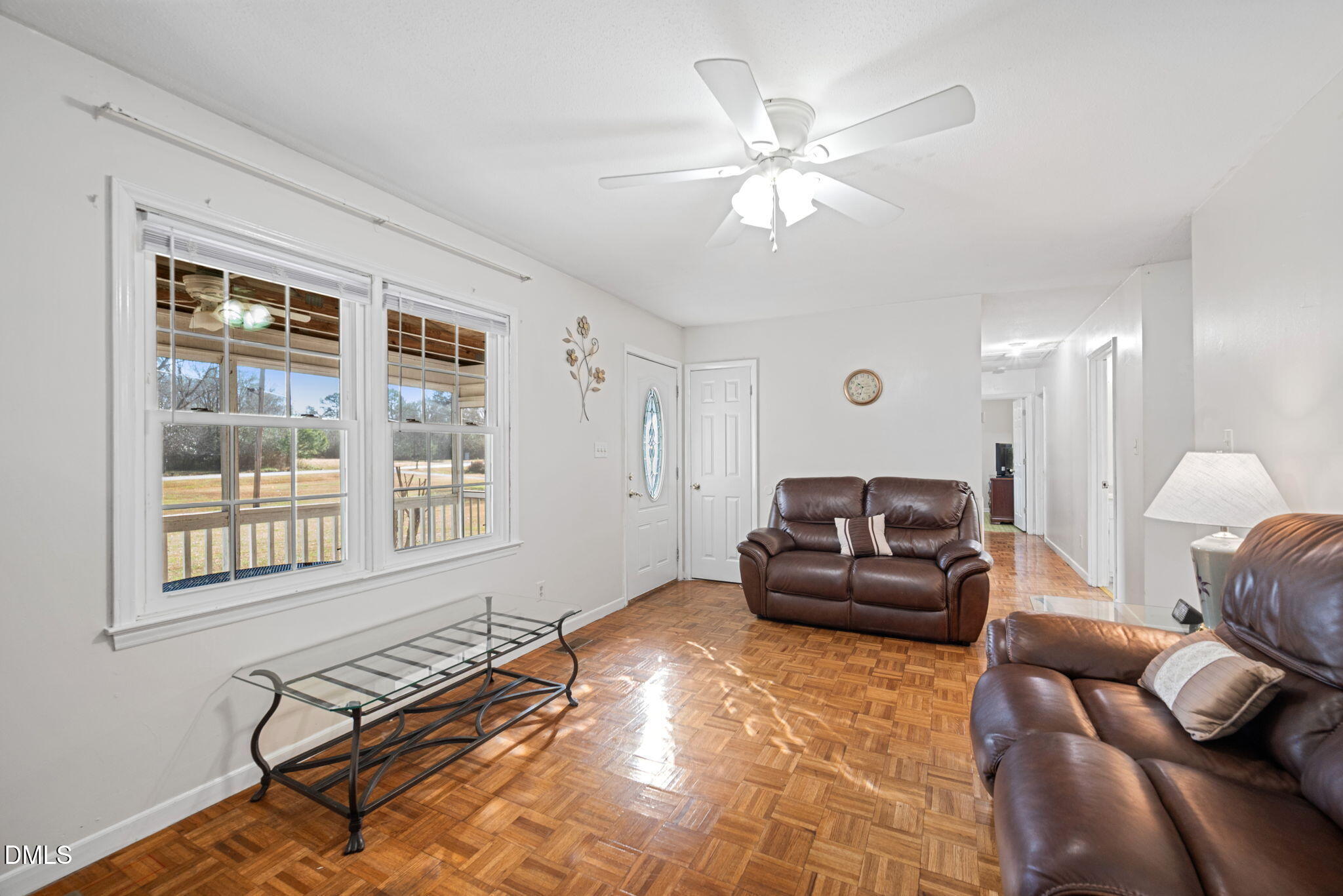 1804 Gade Bryant Road Moncure, NC 27559 - Photo 7 of 38 a living room with furniture and a window