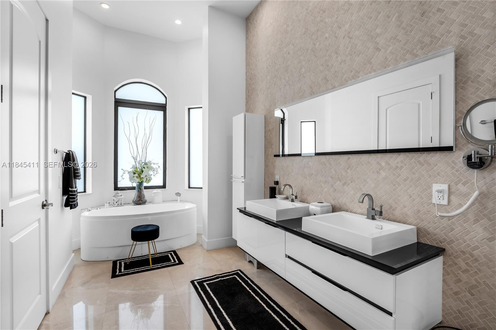 331 Southwest 124th Avenue Miami, FL 33184 - Photo 22 of 69 a bathroom with a sink and a mirror