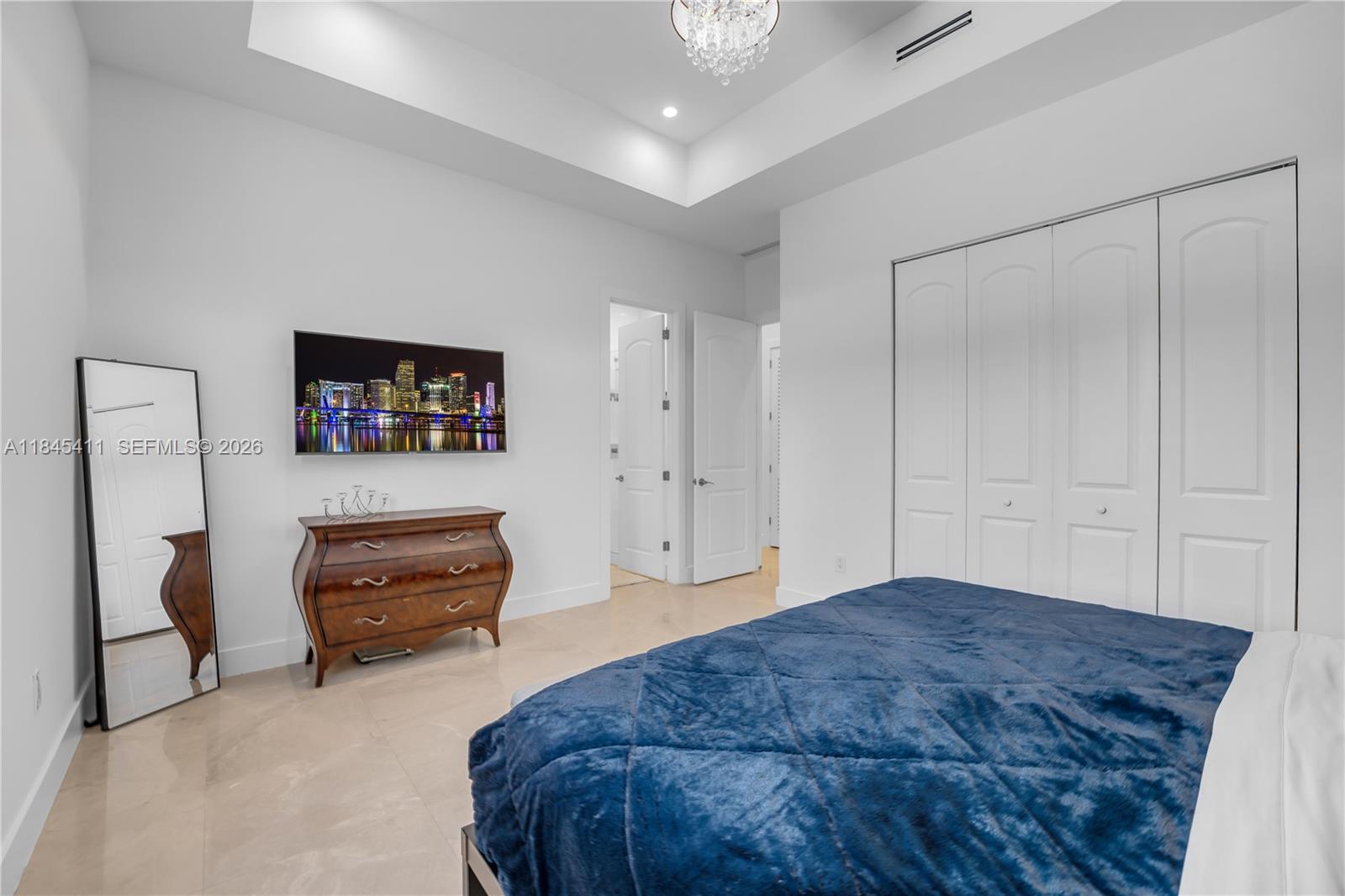 331 Southwest 124th Avenue Miami, FL 33184 - Photo 31 of 69 a bedroom with a bed and a view of bathroom